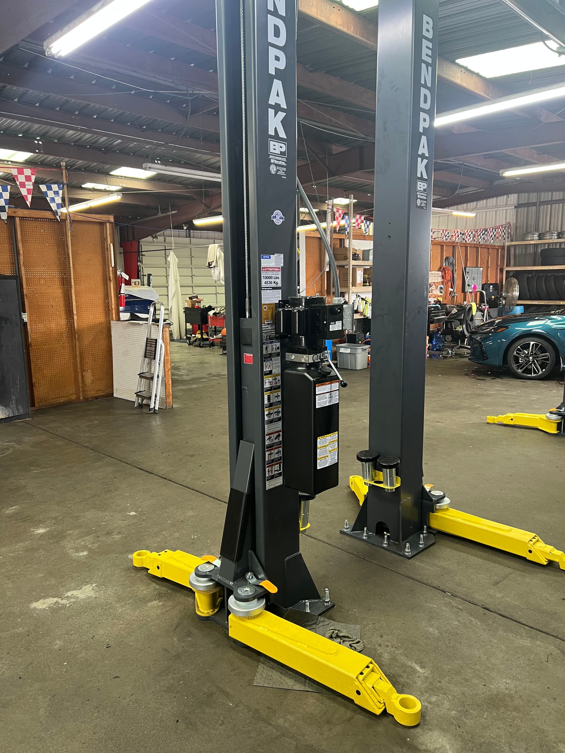 Two-Post BendPak lift wired up and ready to work image