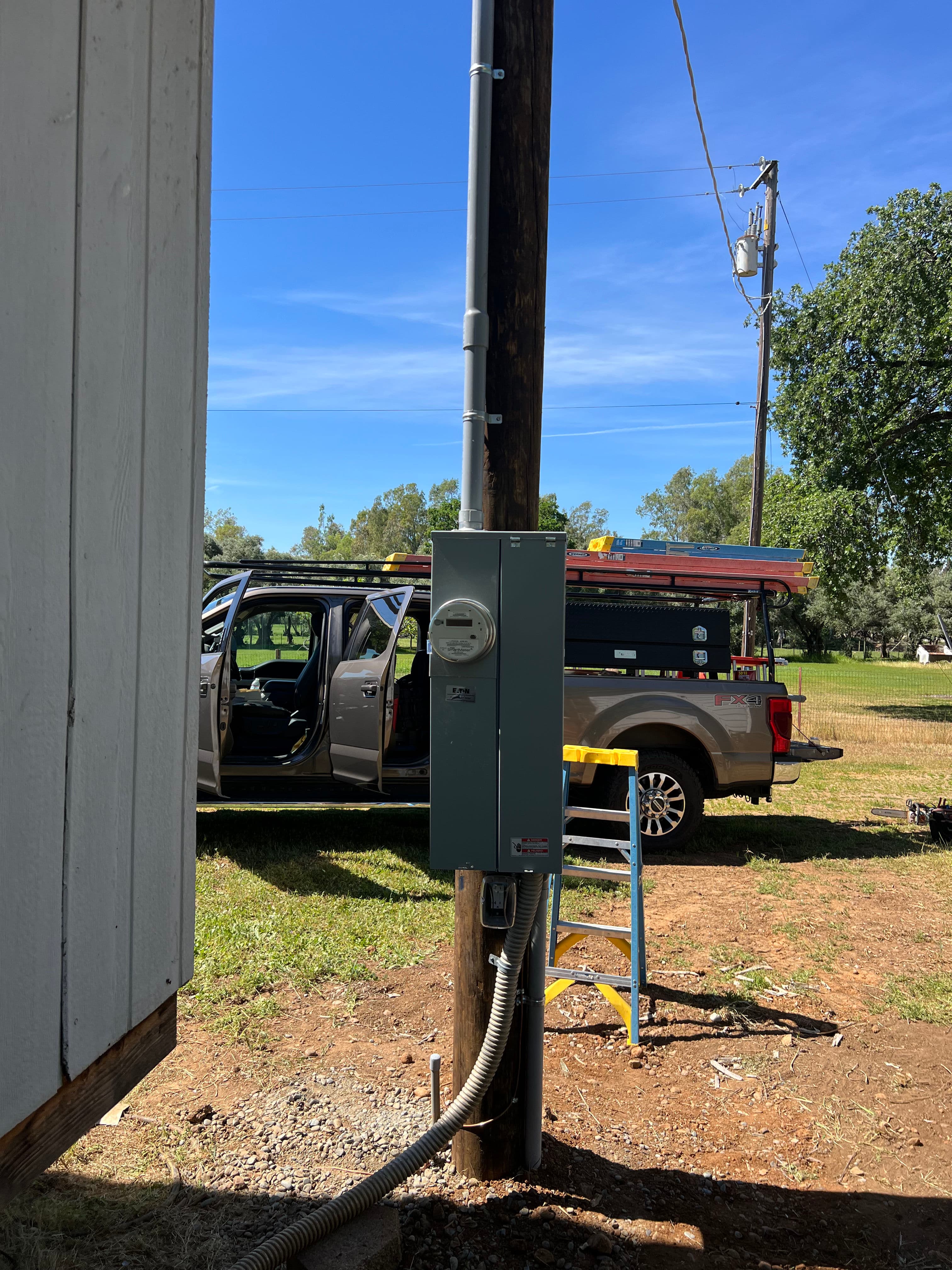 Project Harnessing the Power with Utility Pole Installation and Solar Panels image