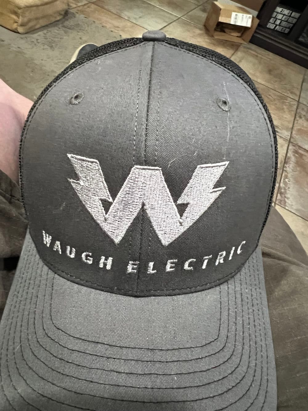 Gray cap featuring the Waugh Electric logo in white and a stylish design.